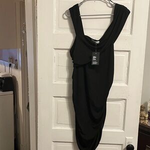 New. Rita Ora , sz XL. Stretch all over black poly knit , easy on n off, open
